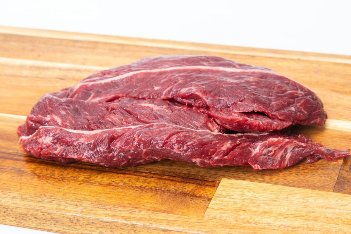 Hanger steak, premium butcher cut beef, raw, savory, delicious.