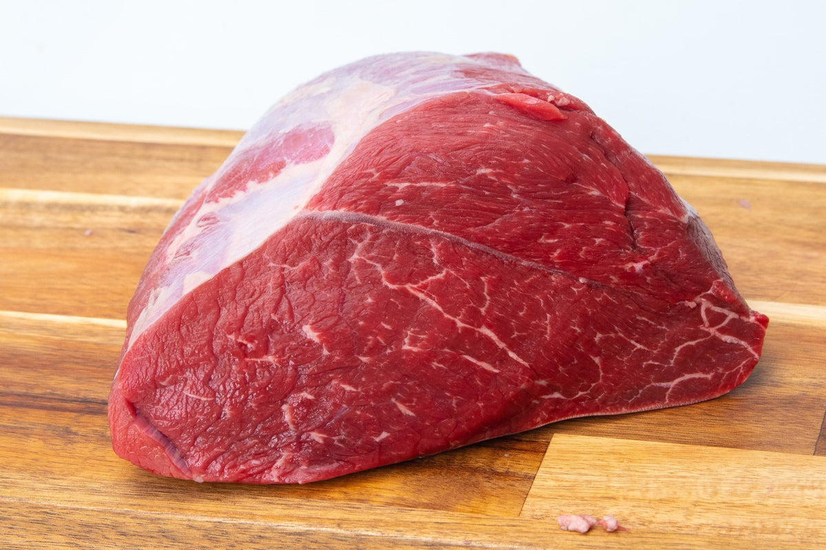 Premium Beef Silver Tip Roast, raw, uncooked, lean, high-quality cut.